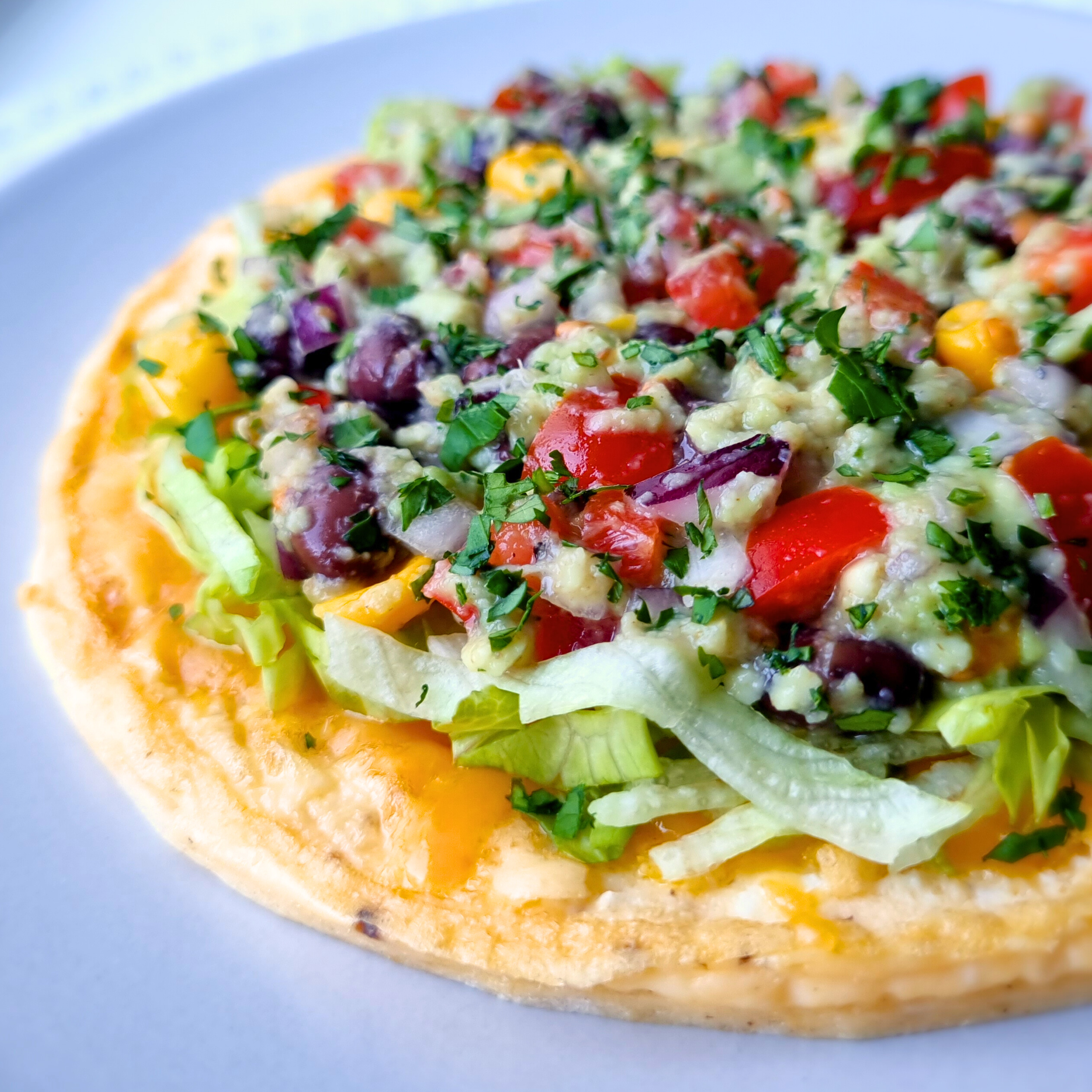 Zachte ontbijttaco met gesmolten cheddar & loaded guacamole
