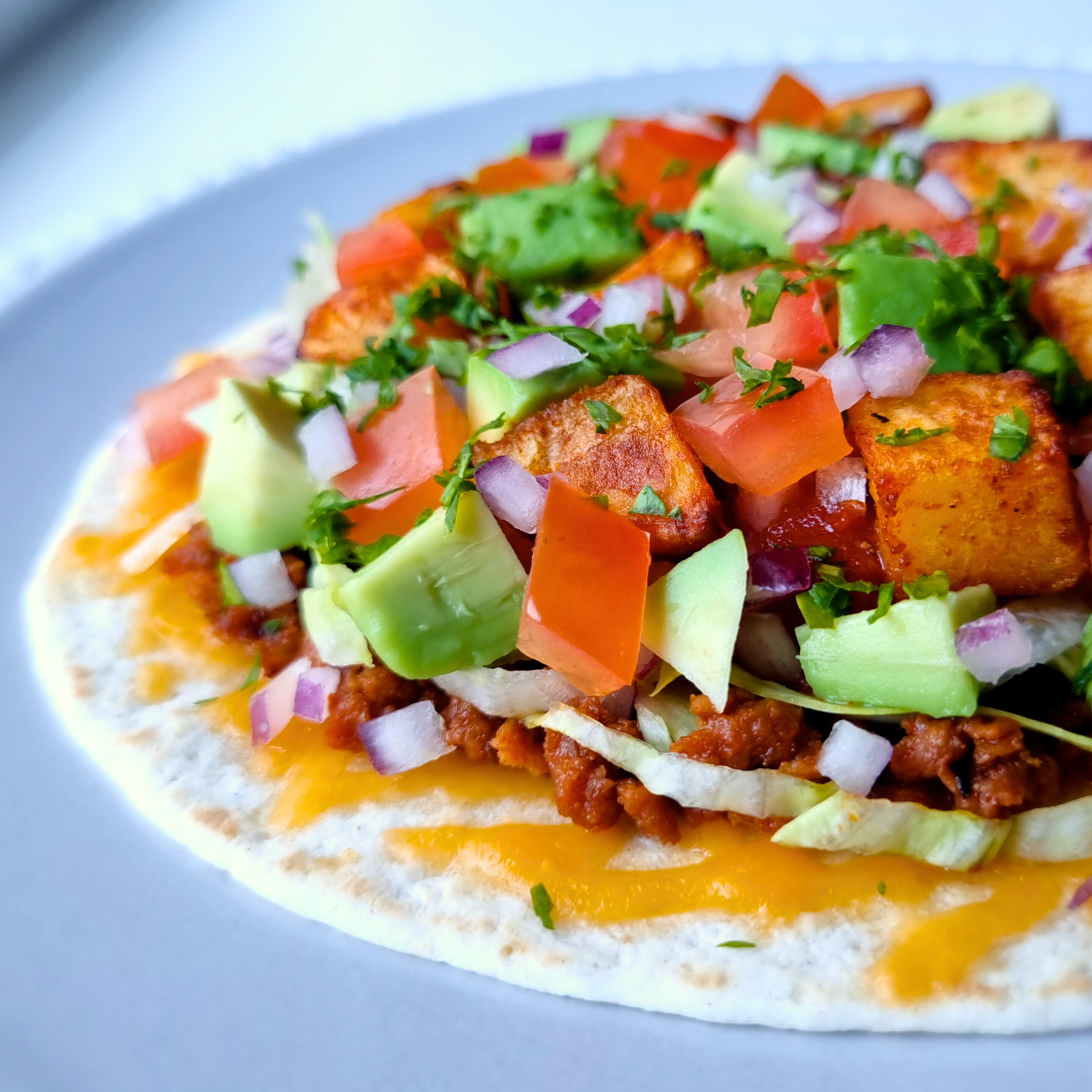 Zachte taco’s met cheddar, aardappeltjes & Mexicaans gekruid vegagehakt – eiwitrijk